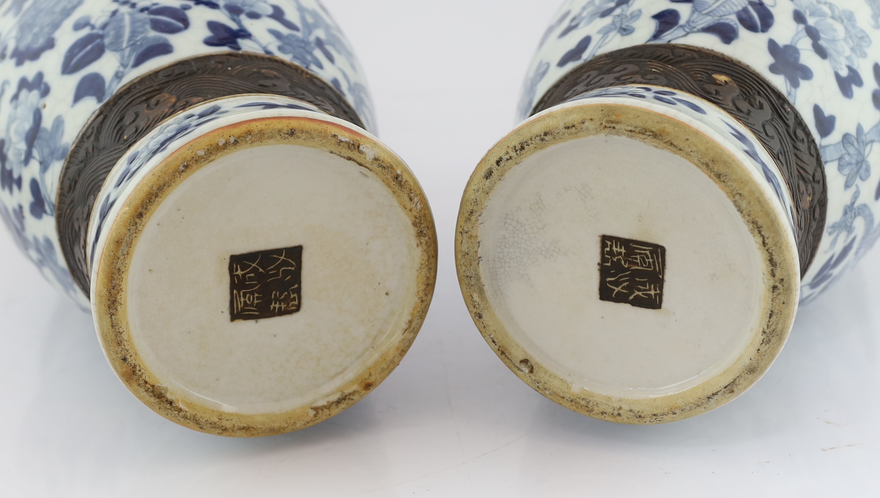A pair of large Chinese blue and white crackle-glaze ‘dragon’ vases, early 20th century